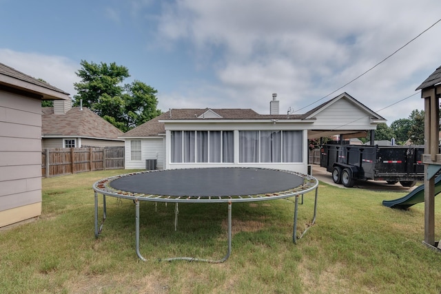 view of yard featuring a trampoline