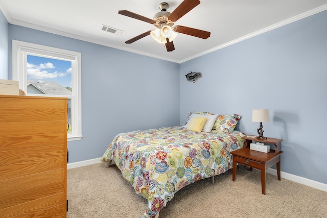 bedroom with ornamental molding, light carpet, and ceiling fan