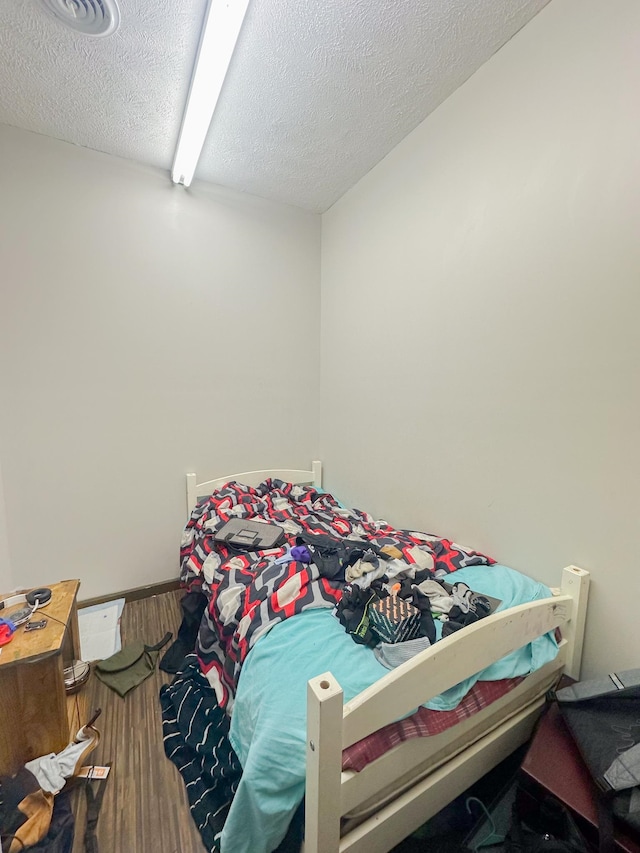 bedroom with a textured ceiling