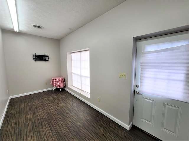 entryway featuring dark hardwood / wood-style floors