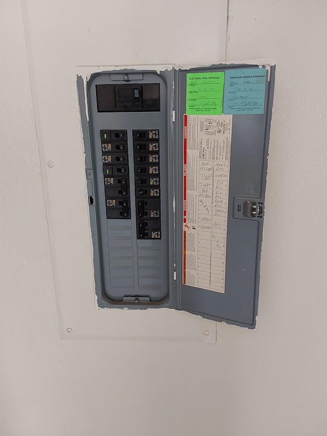 utility room featuring electric panel