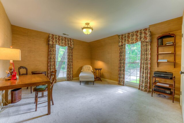 carpeted home office featuring visible vents