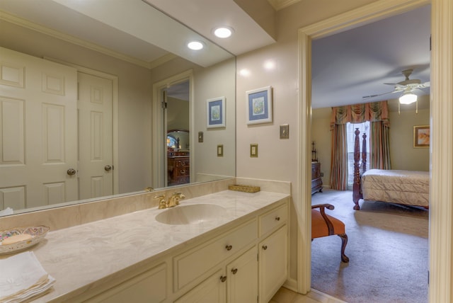 ensuite bathroom featuring vanity, crown molding, recessed lighting, ensuite bath, and ceiling fan