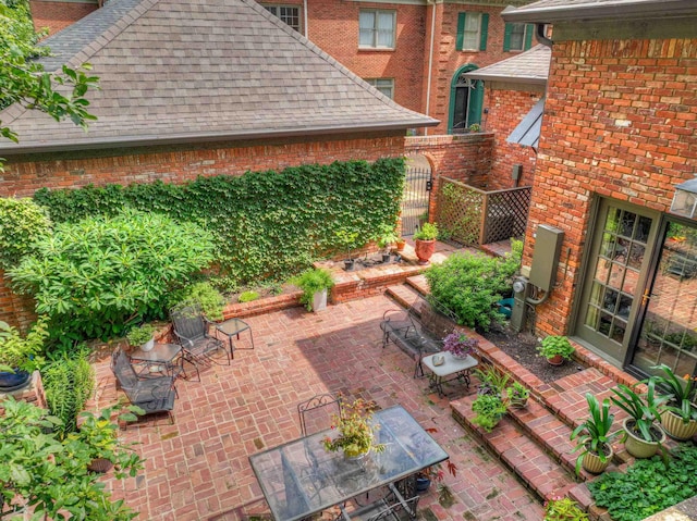 view of patio / terrace with outdoor dining space and fence