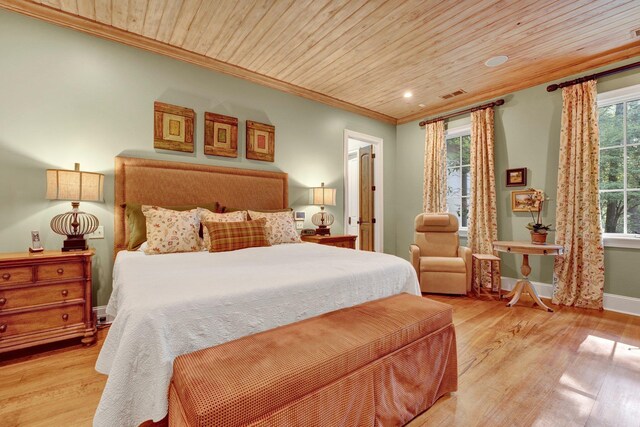 bedroom with crown molding, light hardwood / wood-style flooring, and wood ceiling