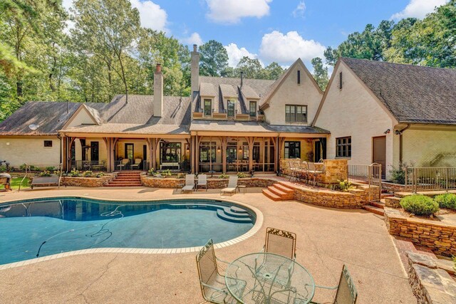 view of pool with a patio area