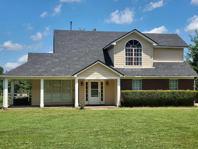 view of front of property featuring a front yard