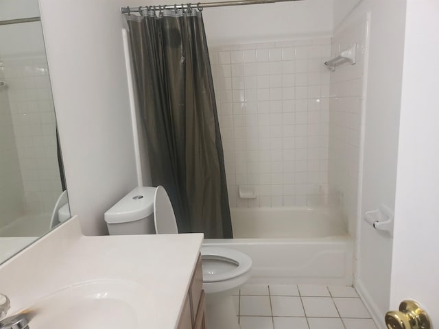 full bathroom featuring tile patterned floors, toilet, vanity, and shower / bath combo