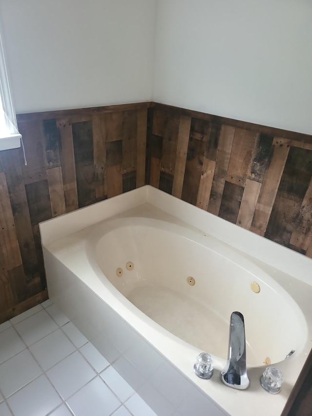 bathroom featuring a bathtub and tile patterned floors