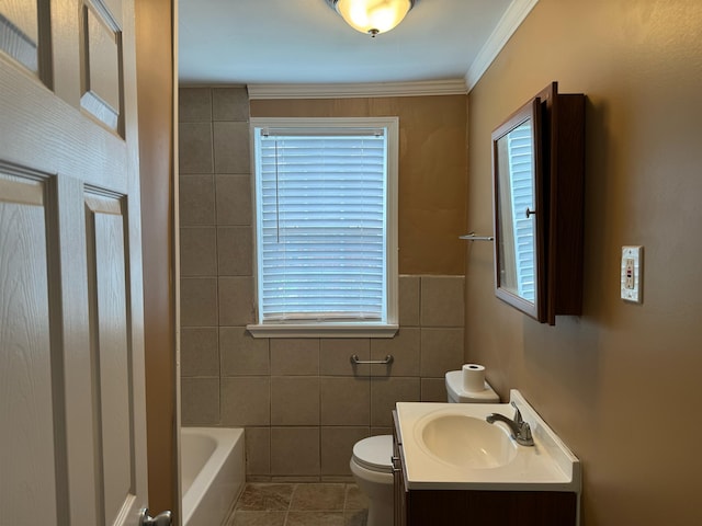 bathroom featuring toilet, crown molding, tile patterned floors, tile walls, and vanity