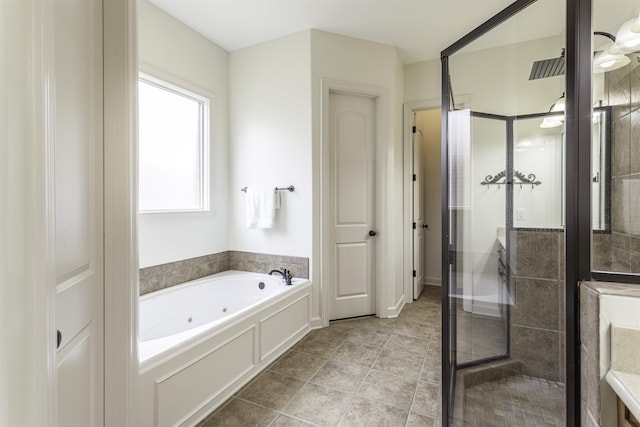 bathroom featuring tile patterned floors, french doors, and separate shower and tub