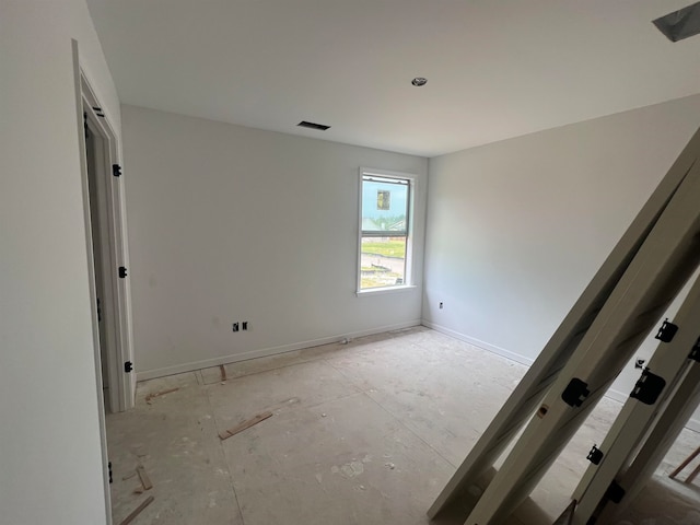 unfurnished bedroom featuring baseboards