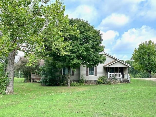 view of front of home with a front lawn