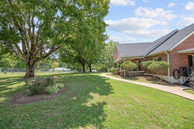 view of yard featuring fence