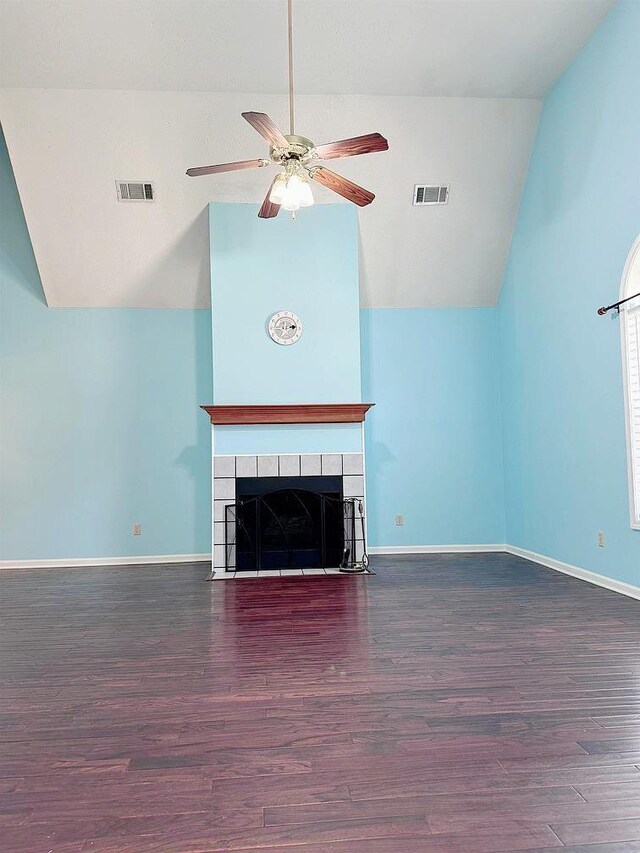 unfurnished living room with a fireplace, high vaulted ceiling, ceiling fan, and wood-type flooring