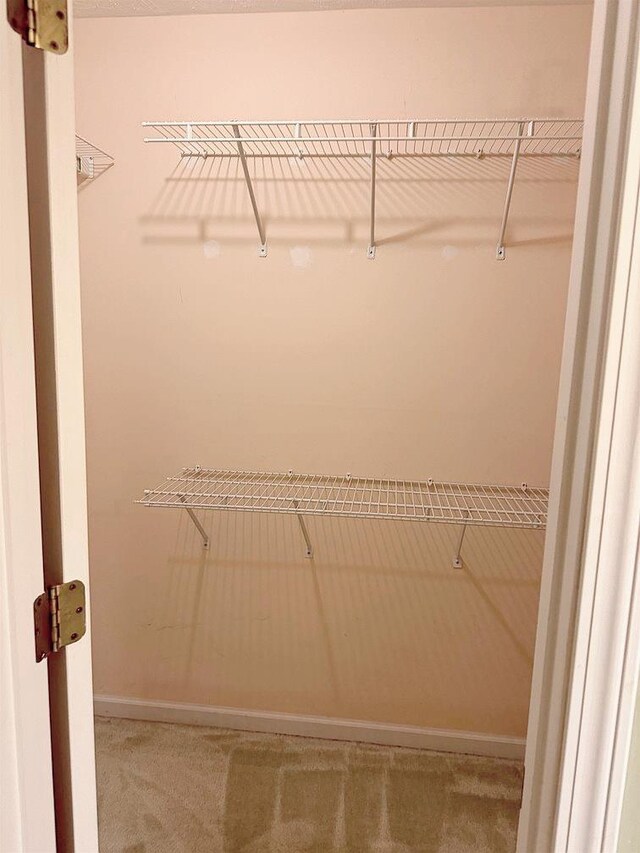 full bathroom featuring toilet, vanity, tiled shower / bath, and tile patterned floors