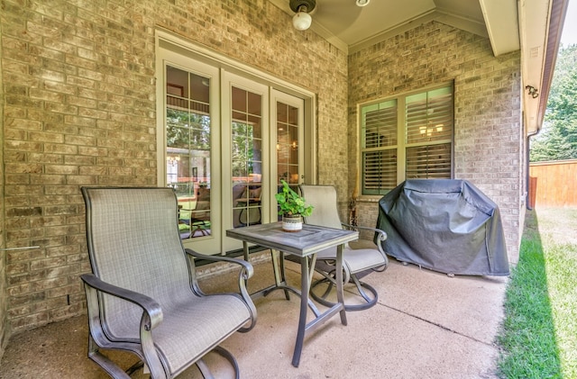 view of patio featuring a grill