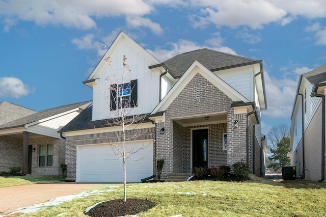 view of front of home featuring central AC unit, brick siding, driveway, a front lawn, and board and batten siding