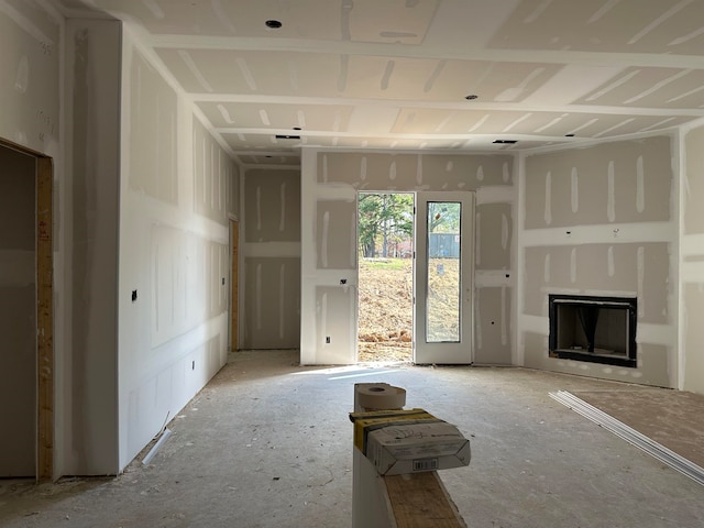 unfurnished living room with a fireplace