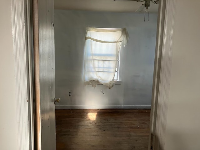 spare room featuring ceiling fan and wood-type flooring