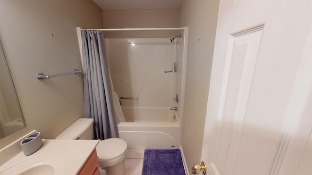 bathroom with toilet, shower / tub combo, vanity, and tile patterned floors