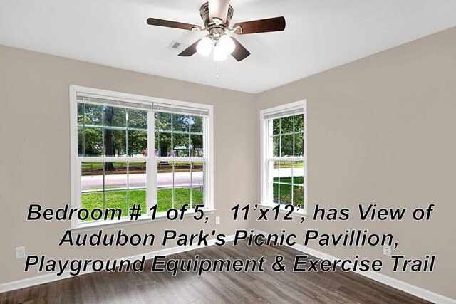 spare room featuring ceiling fan and wood-type flooring