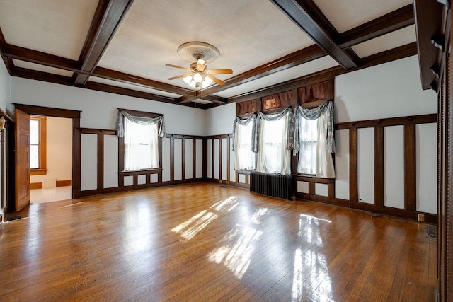 entryway featuring stairs, wood finished floors, wallpapered walls, and ornamental molding