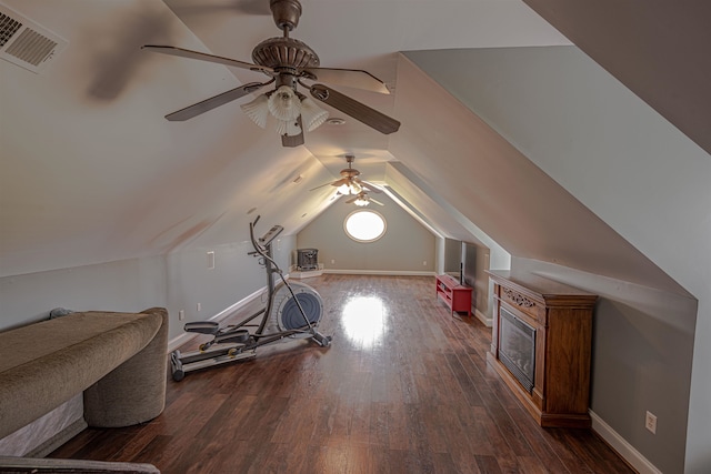 additional living space with ceiling fan, dark hardwood / wood-style floors, and lofted ceiling