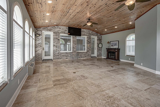 unfurnished living room with wood ceiling, brick wall, ceiling fan, and light tile patterned floors