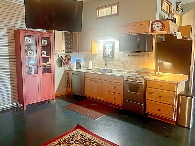 kitchen with decorative backsplash, stainless steel dishwasher, light brown cabinetry, gas range, and sink