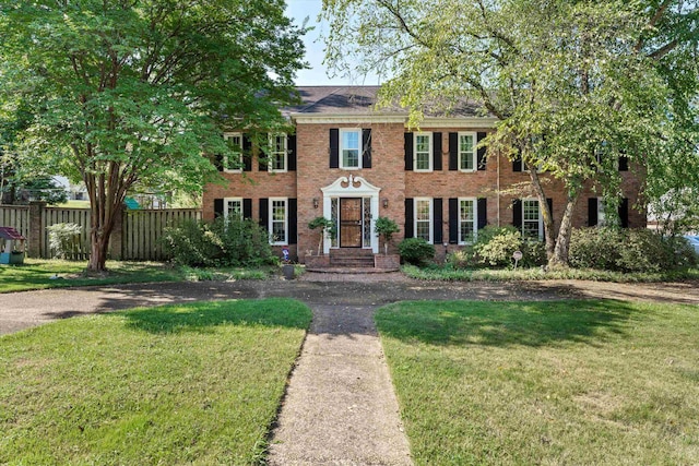 view of front of home with a front lawn