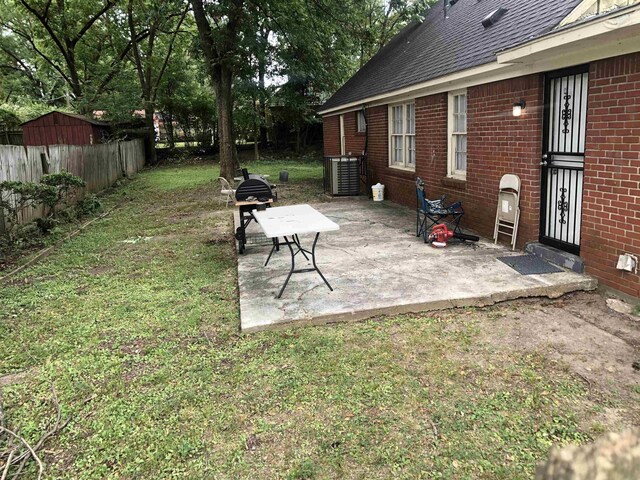 view of yard with a patio and fence