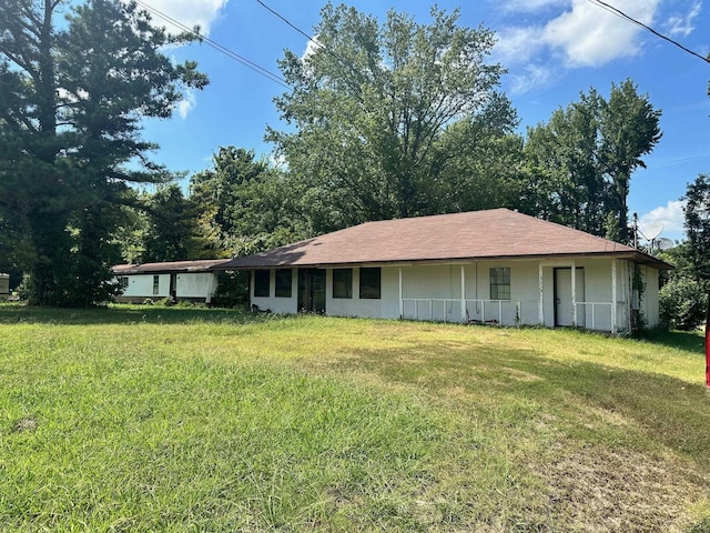 ranch-style house with a front yard