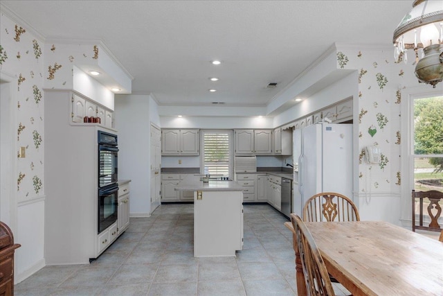 kitchen with stainless steel dishwasher, double oven, white refrigerator with ice dispenser, a center island, and light tile patterned flooring