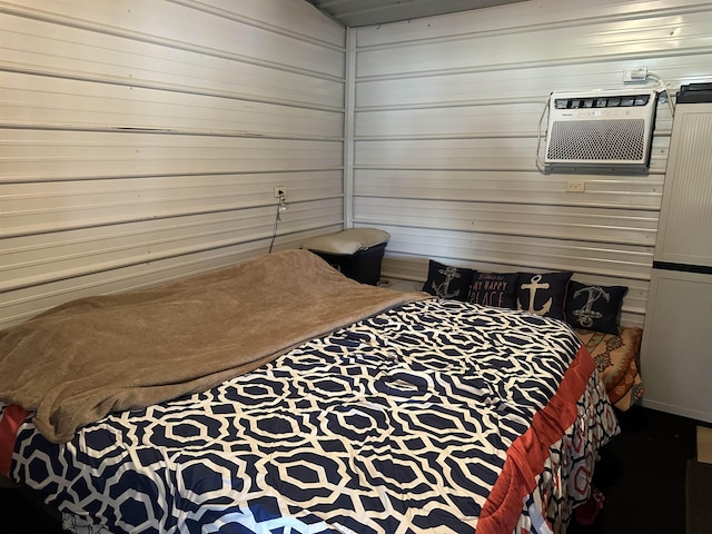 bedroom with a wall mounted air conditioner