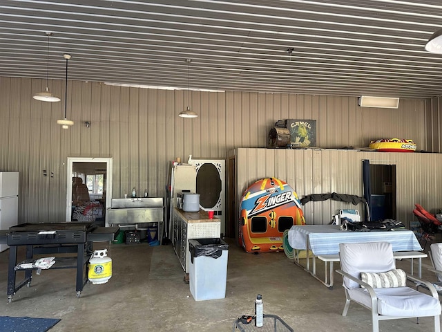 garage featuring freestanding refrigerator