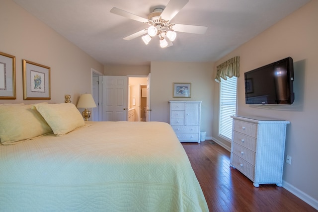 bedroom with ceiling fan and dark hardwood / wood-style floors