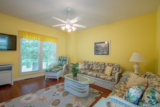 living room with ceiling fan and wood-type flooring