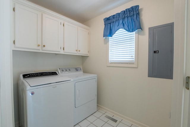 100 Vantage Pt, Counce, TN 38326 - clothes washing area with washer and clothes dryer, light tile patterned flooring, visible vents, cabinet space, and electric panel