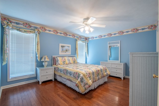 bedroom featuring ceiling fan and wood-type flooring