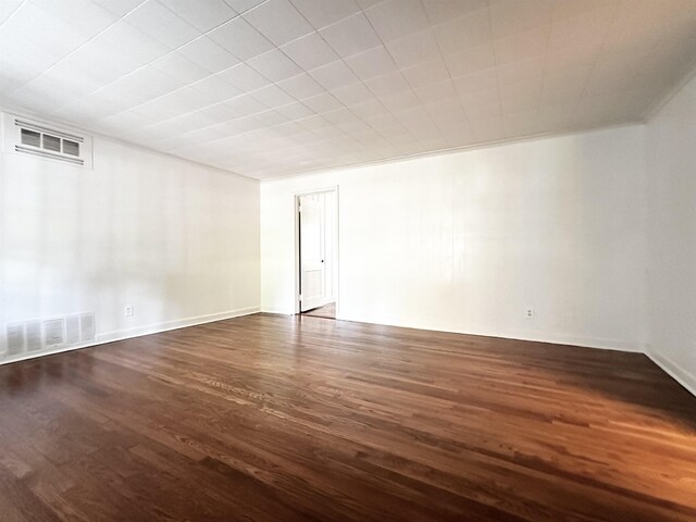 spare room featuring hardwood / wood-style floors