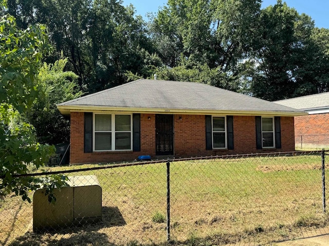 ranch-style house with a front lawn