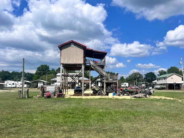 view of play area featuring a yard