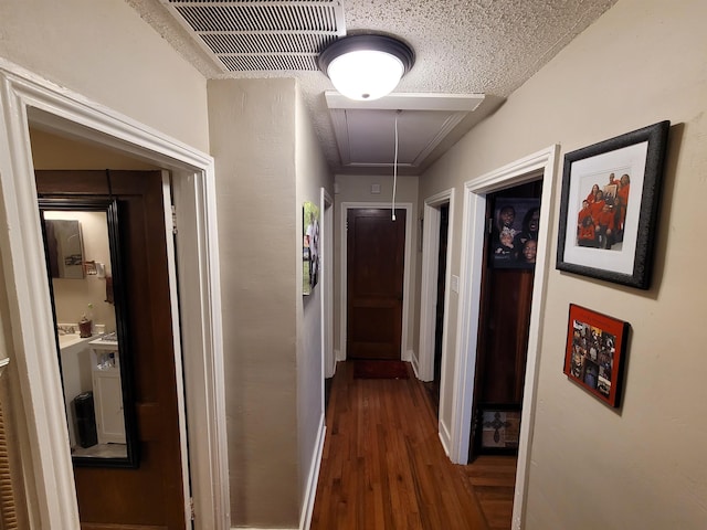 hallway featuring wood-type flooring