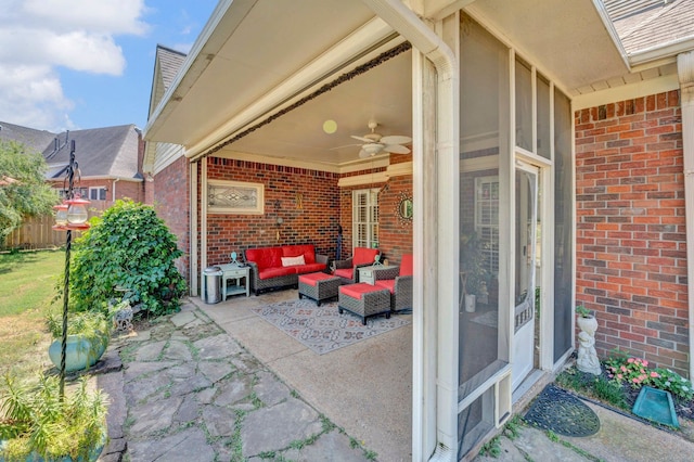 view of patio with ceiling fan and an outdoor living space