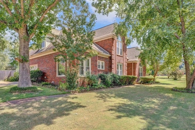 view of front of home with a front yard