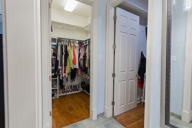 spacious closet with light wood-type flooring