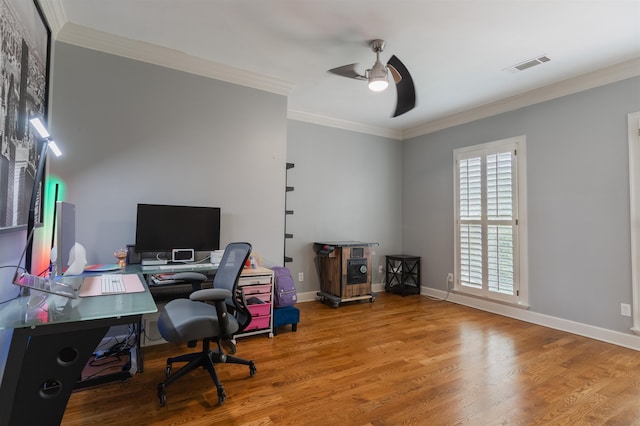 office area with ceiling fan, crown molding, and wood-type flooring