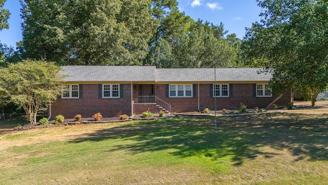 ranch-style house with a front yard