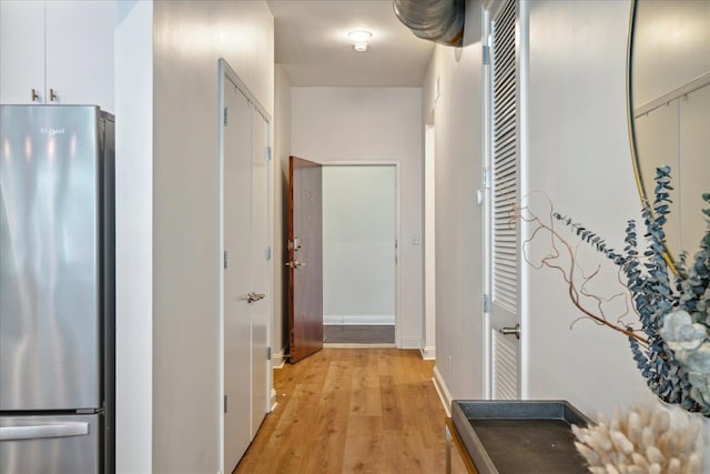 hallway featuring light hardwood / wood-style floors